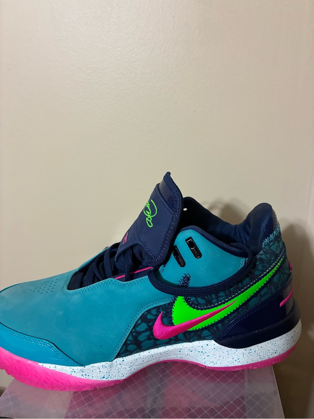 Nike men’s Teal, Pink & Neon Green Basketball Sneakers